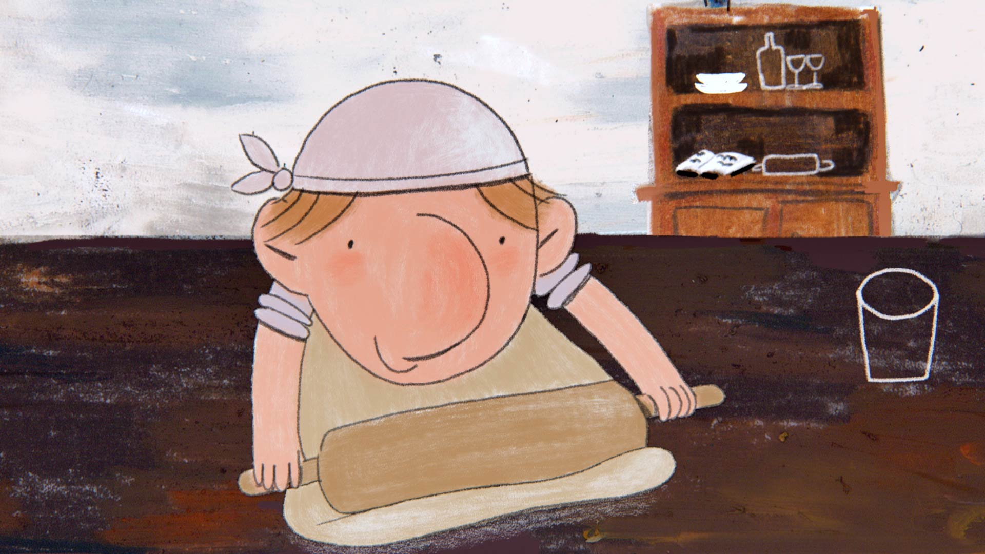 2D animation image. Hand-drawn with a black outline, a character with a big nose, black dots for eyes, blond hair, a white scarf tied around his head and his sleeves rolled up, is rolling out dough with a rolling pin on a dark brown surface. To the right, on the same dark surface, lies the white outline of a glass. In the background is a brown cupboard with two shelves displaying plates, glasses and a bottle, as well as an open book and a kitchen roll.